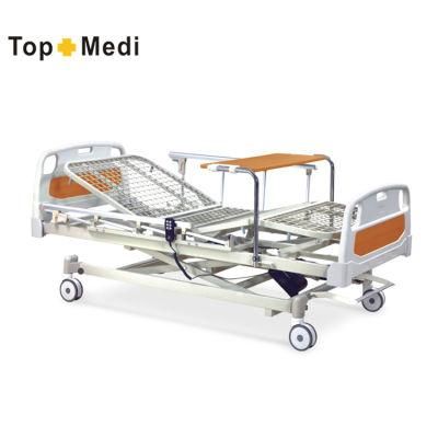 Topmedi Medical Equipment Three Function Steel Electric Hospital Bed with Overbed Table